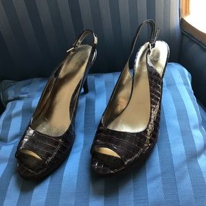 Nine West Brown peep toe pumps. Worn one time!